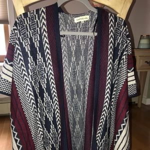 Poncho with fringe bottom